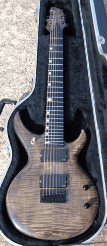 Flame maple on Ash.&nbsp; EMG 707 pickups!
