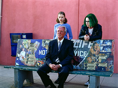 Birch questions a would-be bus rider while Johansson looks on