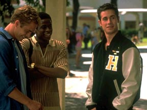 Freddie Prinze Jr. (r) and companions