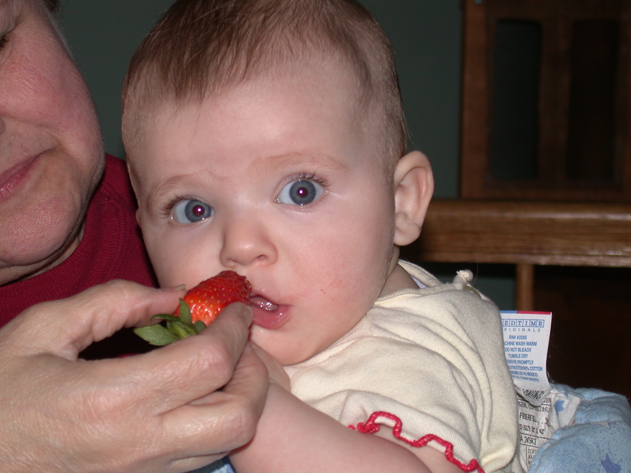 kat's first stawberry @ grandma's