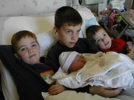 Nick, Zach and Jacob w/ Mikayla