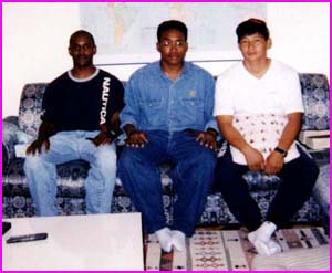 Me, my friend, and our instructor in Kuwait.