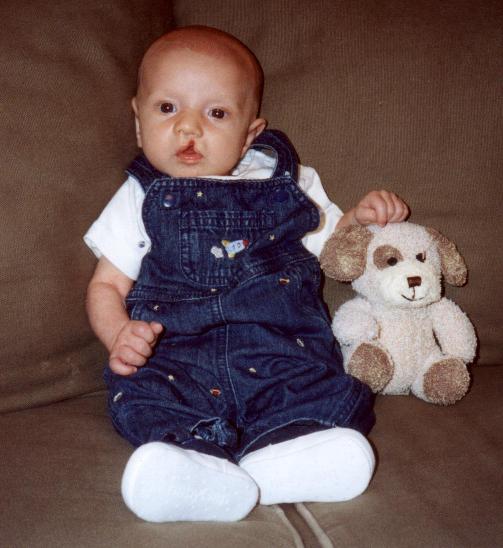 Ashton loves his teaddy bear.