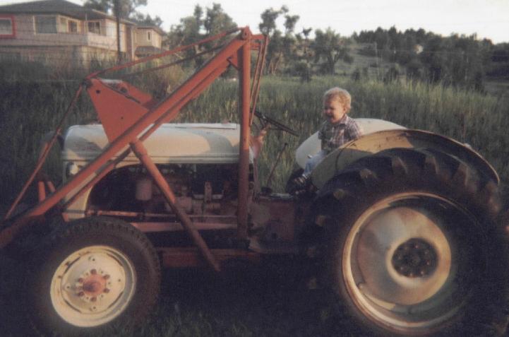 Ashton crying on the tractor