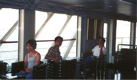 My mom taking a snap again of us on some cruise of Tokyo harbour.&nbsp; "A Three Hour Tour, A Three Hour Tour...."