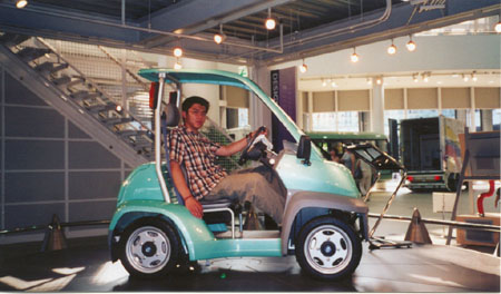Side view, I guess it really just is a golf cart.
