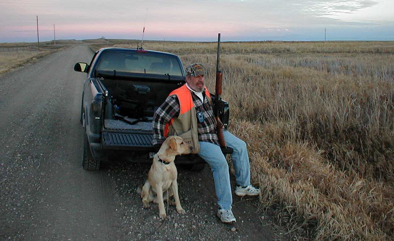Dan and Pepsi (Sara's Dog) watching the action.....and being lazy....