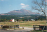 Thumbnail - A geographically interesting hill located next to a farm