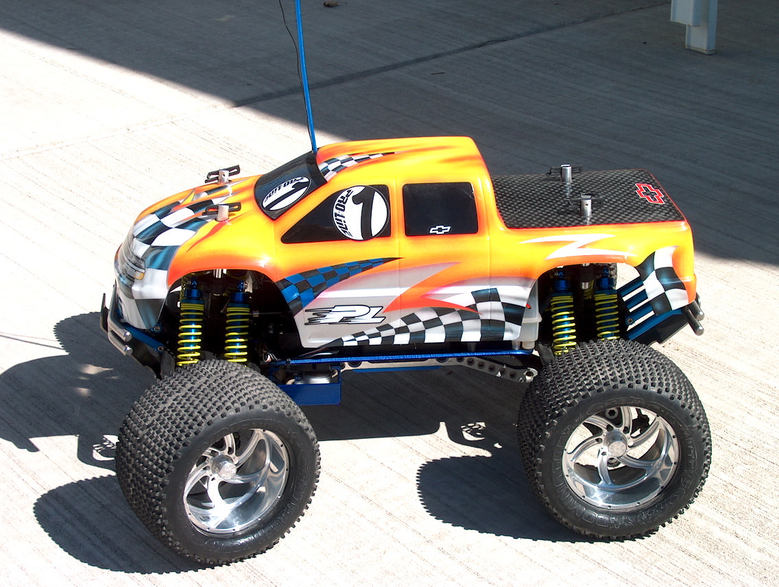 Chevy Silverado Extra-Cab with Scorcher Paint Job by Moskito. For more information, visit: www.moskitokustoms.com
