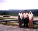 Sat, Nov 06. Mrs. & Mr. Ahmad with mom on the M'sia - S'pore super highway.