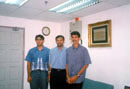 Friday, Oct 29.  Landed M'sia (KLIA) safe.  1100 hrs. At uncle Dr. Nather Khan's office; flanked by Shamsudin & Malik.