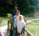 Returning home after showers.  Mrs. Anees Ahmad joins us.
