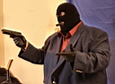 suit-mask-gun-cigar.JPG