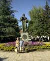 Mary and Alice in front of statue