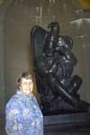 Alice in front of statue