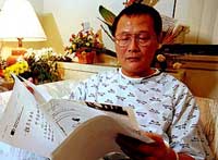 Wei with Glasses