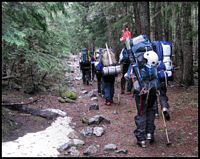 Hiking through forest, and some snow starting to appear...