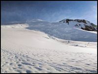 Weather clearing over Mt. Rainier & LIberty Cap (to right)