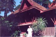 At the front door of Jim Thompson's house