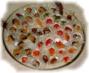 Um prato de doces finos para seu deleite. Todos feitos ao nosso jeito. S�o doces de nozes e am�ndoas