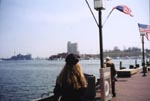Callie taking a picture of the harbor, totally unaware that Candace is taking this picture of her taking a picture the harbor.&nbsp; Candace knew that this was the only way she'd get Callie to be in a picture.