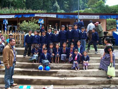 Children graduating from the scholarship program