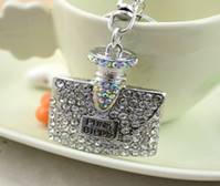 Description: New Cute Rhinestone Perfume bottle Key chains Ring Fashion Metal Keychain Keyring Women Jewelry PWK0147(China (Mainland))