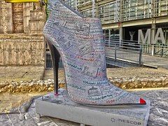 Description: Footwear, Shoe, Statue, Heeled Shoe