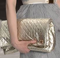 Description: Description: C:\Users\khalid\Pictures\louis-vuitton-limelight-clutch-pearl.jpg