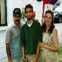 Dad, me, and Mom at my H.S. graduation open house
