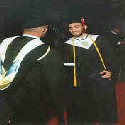 Yeaaahh!!  Me getting my diploma (actually, it was a fake diploma on stage) from High School.