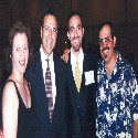 (l to r) My mom, Luis Caldera (U.S. Secretary of the Army), Me, and my Dad at a scholarship banquet.
