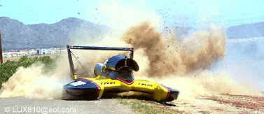 The "Miss T-Plus" digs into the shore of Firebird Lake in Arizona.