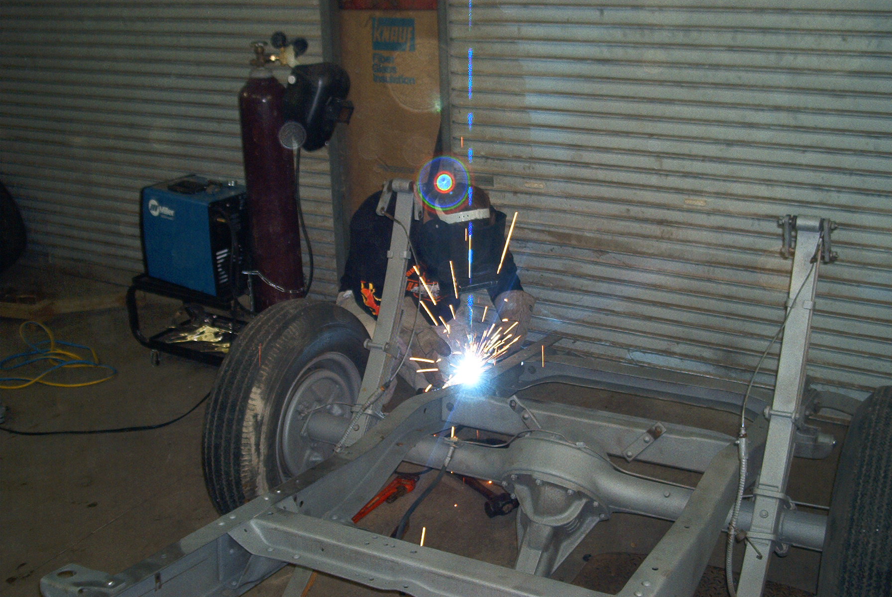 Mike is getting out a stubborn bushing!