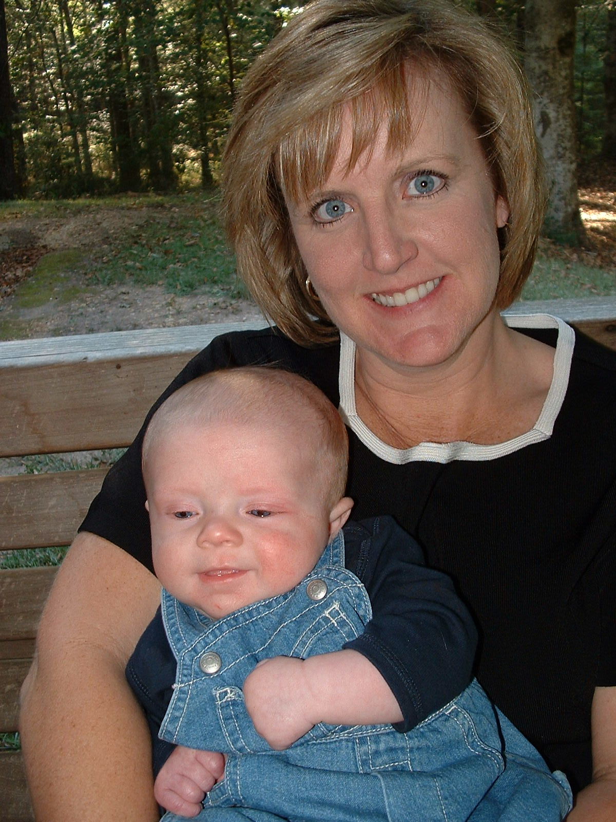 JohnPaul is thinking, "I wonder if she knows how I have her wrapped around my finger?"