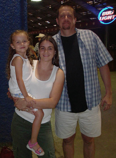 Murren, Holly, and John at the Rodeo in 2006