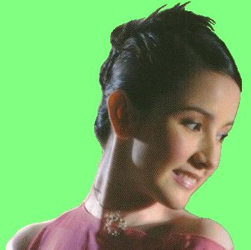 Forever young and with the same enchanting face... (CLICK picture for a media player download of Marielle singing 'This Time' on kool on kam)