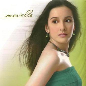 CLICK on image to hear Marielle singing one of her earliest compositions. 