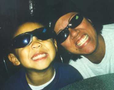 Kirby and Auntie Toni showing off their grins.