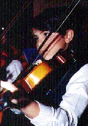 Integrante de la Orquesta Infantil de Macul, foto de Soledad Ugarte