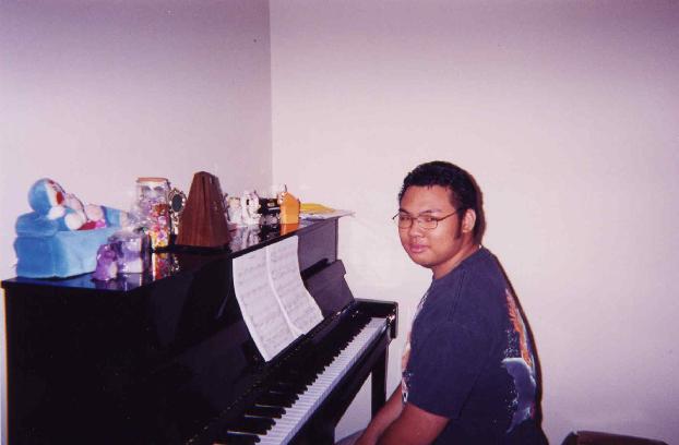 Sam acting like a Musician. Is he really?? Nobody knows!!!