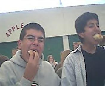 2 Mexicans stuffing their faces...