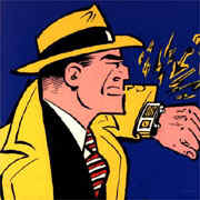 Dick Tracy using a wrist-radio