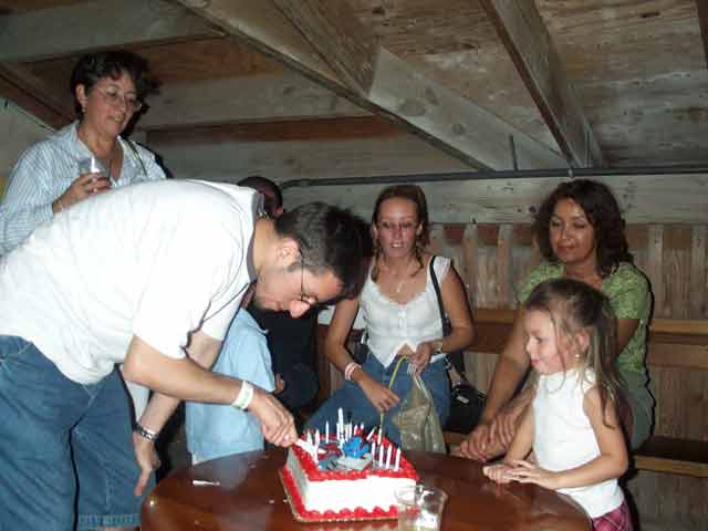 And Cutting the SpiderMan Cake