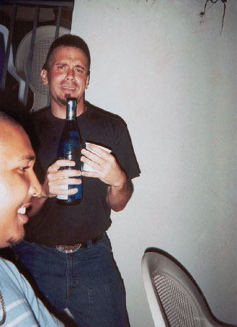 Enrique and a bottle of wine, is he singing to it?