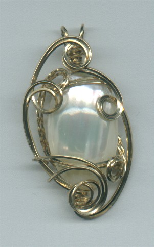 pendant- osmina pearl shell set in 14K gold filled wire
