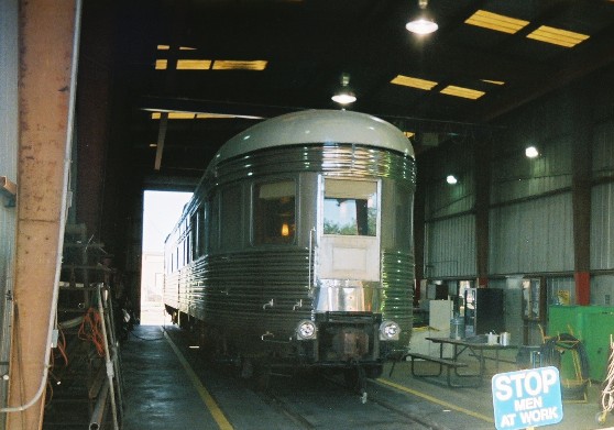 The corperate business car of the FEC Railway, the 'Azalea', is parked in the workshed at Bowden yard December 2005