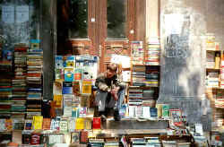Second hand book vendor on the steps of University of Bucharest 