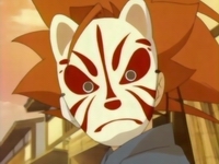 Tetsu wearing a festival mask.