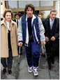 With his mother, Bruna, and his father, Gino, in France, after his injury in 1998
